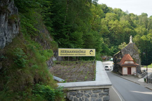 Signposted entrance area of Herrmann’s Cave with LED light