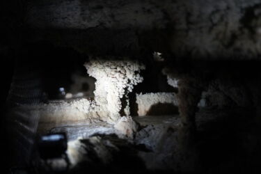 LED spotlights highlighting stalactite formations in Herrmann’s Cave